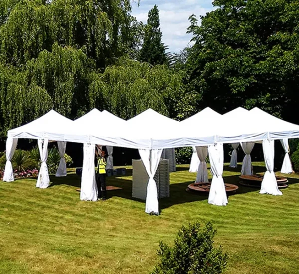 L-shaped-marquee-hire-in-garden-party